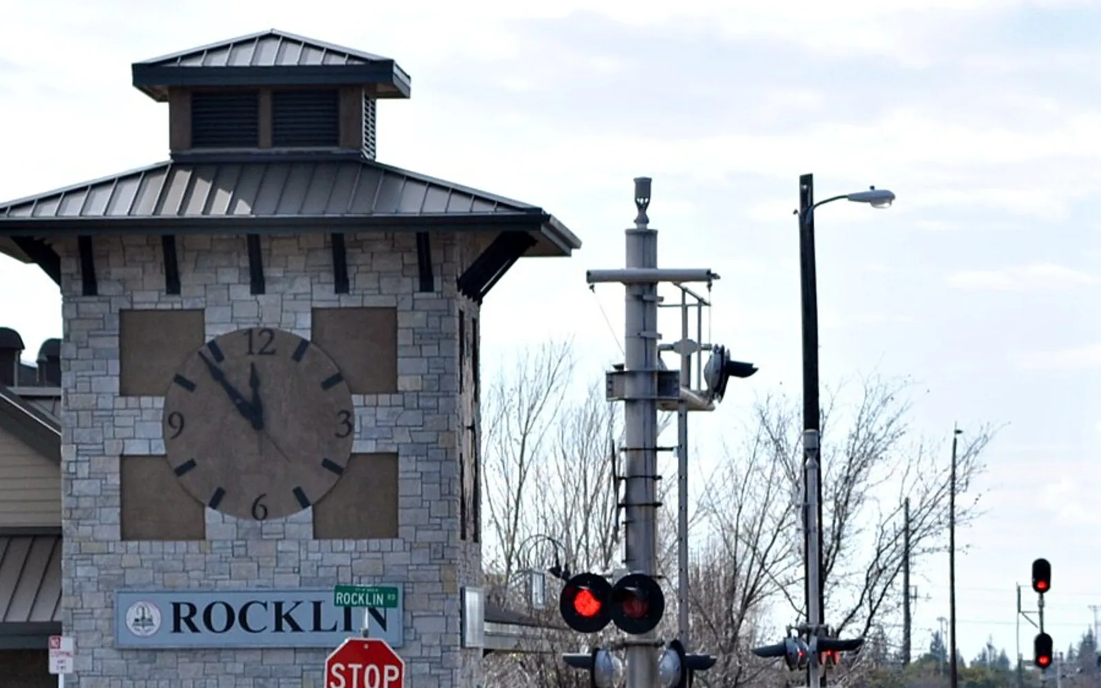 Clock tower and rail signals at Rocklin Amtrak station.
